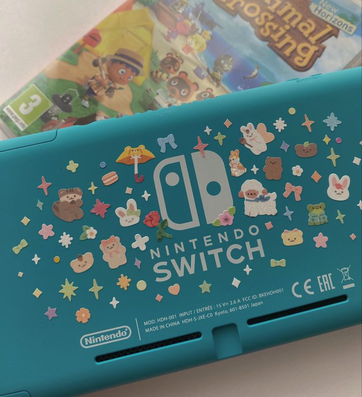 the nintendo switch case is blue and has cartoon stickers on it's side