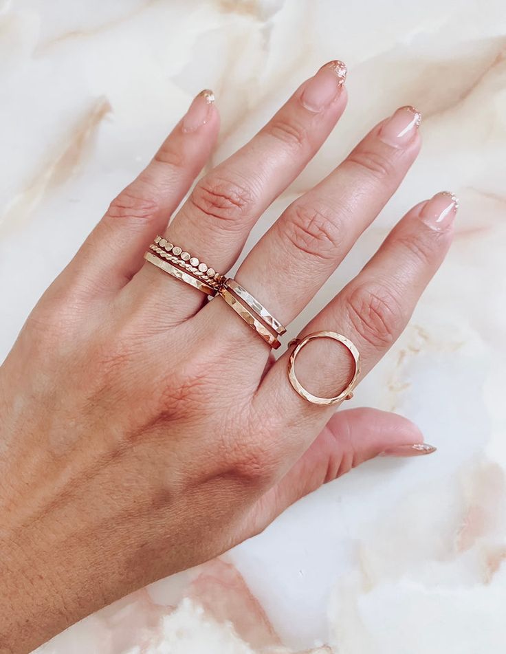 Our Karma Circle Ring is completely handmade. It is made of 14K gold-filled, rose gold-filled, or sterling silver and has been full hammered to give a spectacular sparkle and unique style. Circle Means: The circle is a universal symbol with extensive meaning. It represents the notions of totality, wholeness, original perfection, the Self, the infinite, eternity, timelessness, all cyclic movement, God ('God is a circle whose centre is everywhere and whose circumference is nowhere') Material sterl Rose Gold 14k Gold Circular Jewelry, Everyday Rose Gold Circle Jewelry, Modern Circular Rose Gold Jewelry, Everyday Rose Gold Jewelry With Ring Detail, Tarnish Resistant Rose Gold Round Rings, Tarnish-resistant Rose Gold Round Rings, Everyday Hammered Rose Gold Jewelry, Everyday Hammered Ring, Everyday Rose Gold Hammered Jewelry