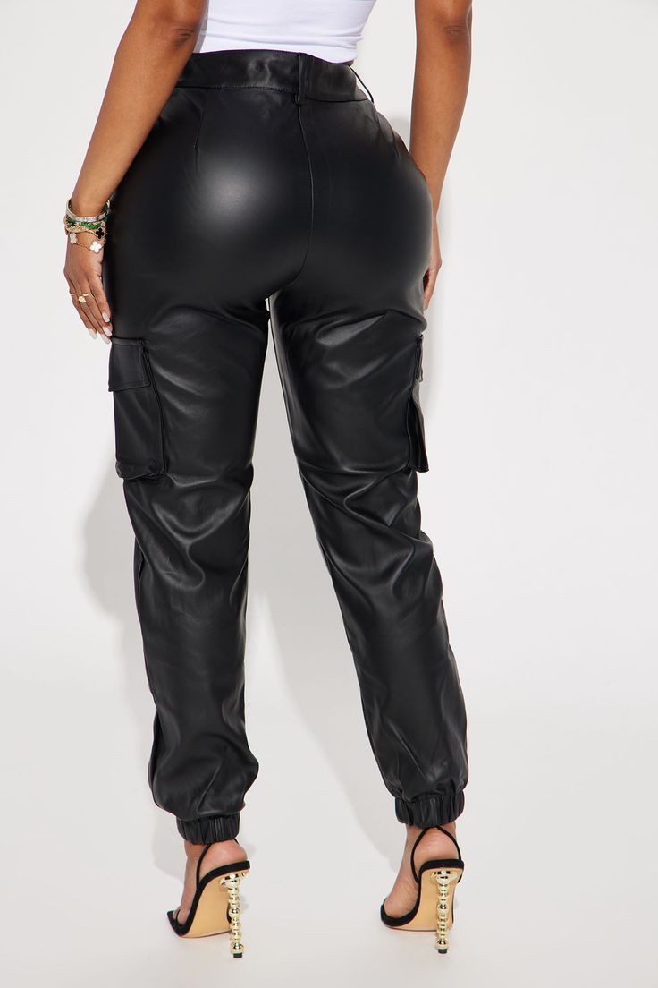 Available In Black. Faux Leather Pocket Detail Pant PU Pant Button and Zipper Closure Jogger Leg Stretch High Rise Self: 100% Polyurethane Lining: 100% Polyester Imported | Let's Talk Faux Leather Cargo Jogger Pant in Black size Large by Fashion Nova Utility Faux Leather Bottoms With Pockets, Utility Style Faux Leather Bottoms With Pockets, Black Faux Leather Bottoms With Button Closure, Faux Leather Cargo Pants For Fall Streetwear, Casual Faux Leather Cargo Pants With Belt Loops, Black Faux Leather Cargo Pants With Pockets, Casual Faux Leather Cargo Pants For Streetwear, Utility Faux Leather Pants With Pockets, Casual Faux Leather Cargo Pants With Pockets