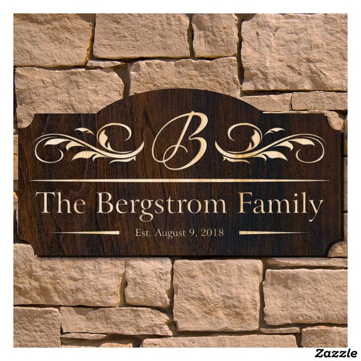 the bergstorm family sign on a stone wall