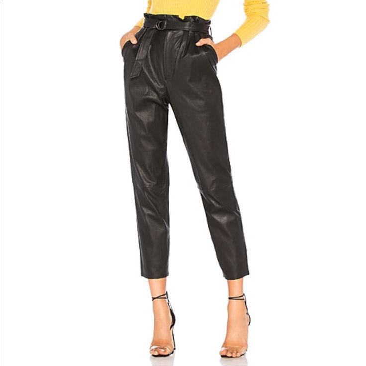 Lost The Belt Nail Laid-Back Elegance With The Lovers + Friends Zeal Pant. Genuine Leather Sculpts This Paperbag Style, While A Belted Waist Strongly Accentuating The Waistline Creates Bountiful Darts Through The Legs Which Taper Neatly To A Crop Just Shy Of The Ankles. Self: 100% Leather Lining: 96% Poly 4% Elastic Professional Leather Clean Only Zip Fly With Hook And Bar Closure Pleated And Belted Waist With D-Ring Closure Side Slant Pockets 16" At The Knee Narrows To 13" At The Leg Opening Imported Chic Leather Pants With Belt Loops For Going Out, Chic Leather Trousers With Belt Loops, Leather Pants With Tapered Leg For Night Out, Leather Tapered Leg Pants For Night Out, Chic Fitted Leather Pants With Belt Loops, Chic Tapered Leg Leather Pants, High-waisted Leather Pants With Belt Loops For Night Out, Fitted Leather Pants With Belt Loops For Party, Party Leather Pants With Belt Loops And Straight Leg