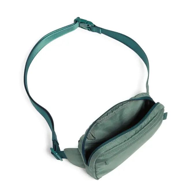 Mini Belt Bag Olive Leaf Far more fashionable than your average belt bag, this compact sidekick is just the ticket for workouts, street fairs and weekends away. Exterior features a front zip pocket and a back slip pocket Interior features three card slips and a ribbon loop for keys Zip closure. Dimensions: 7.0" w x 4.0" h x 1.25" d with 42.0" adjustable strap Functional Green Belt Bag For On-the-go, Green Belt Bag With Pockets For On-the-go, Functional Green Crossbody Belt Bag, Sporty Everyday Belt Bag With Functional Pockets, Sporty Belt Bag With Functional Pockets, Green Belt Bag With Removable Pouch For Outdoor, Green Belt Bag With Removable Pouch For Outdoor Activities, Green Belt Bag With Zipper Pocket For Everyday Use, Functional Green Belt Bag With Removable Pouch