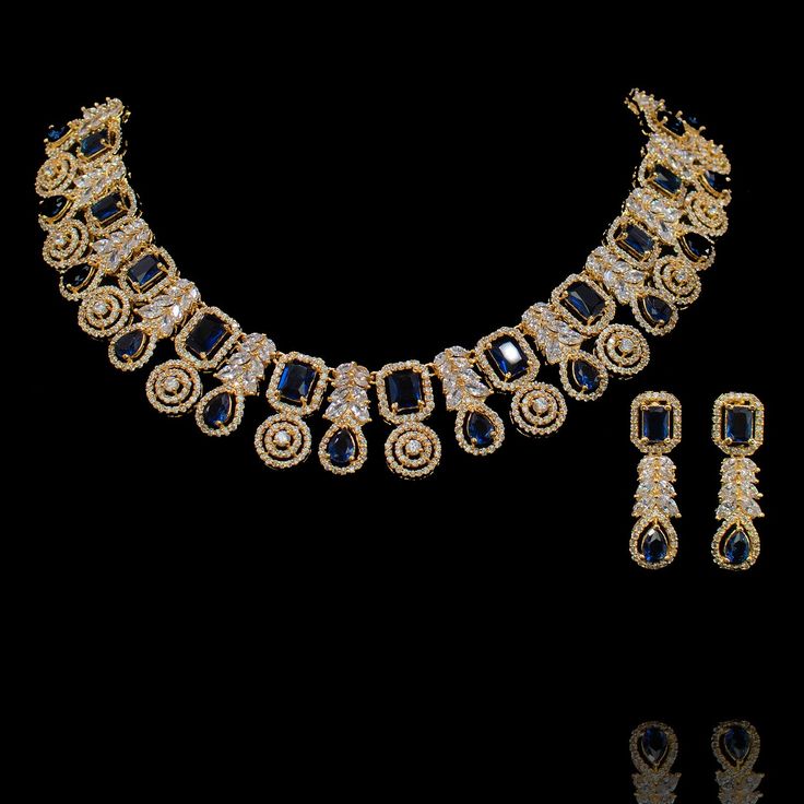 This wear-with-all piece is just perfect for those who love their statement accessories with mixed media flair! Timeless and modern, this hand crafted set dazzle with an elegant frame traced with CZ and sapphire stones. The set includes a necklace and a pair of matching earrings. Approximate earrings length is 1.5". Gold-plated on high-quality brass as base metal. Made by order. Kindly allow 5-7 weeks for the delivery of this item. For custom or urgent requests, please contact support@alacouture Sapphire Stones, Statement Accessories, Elegant Frame, A Necklace, Craft Set, Sapphire Stone, Rumi, Base Metal, Matching Earrings