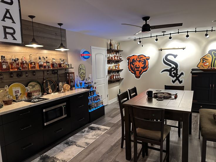 the bar is decorated with sports memorabilia and lights