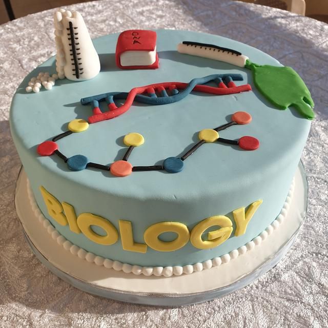 a birthday cake with the word biology on it