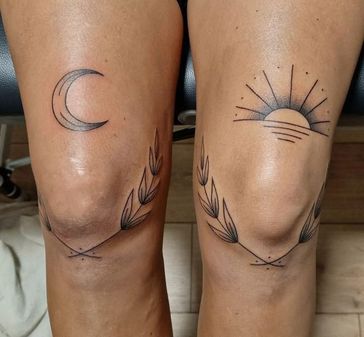 two legs with tattoos on them, one has a sun and the other is a moon