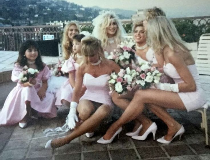 the bridesmaids are all dressed in pink dresses