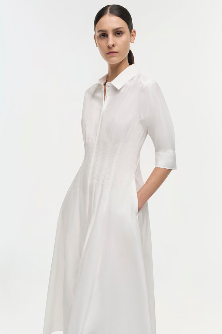 SIGNATURE COLLECTION The Signature Jazz Midi Dress in White. Sharp, shirting inspired designs accentuate a pintucked waist, cuffed sleeves and a classic midi length hemline. Dress Fit: True to size. We recommend sizing up for individuals with a fuller bust. Classic White Shirt Dress For Work, Collared White Midi Dress For Work, White Collared Midi Dress For Work, Classic Formal Shirt Dress, Elegant White Shirt Dress With Placket, Formal Knee-length Midi Dress With Placket, White Placket Dress For Work, Elegant White Collared Dress, Classic Collared Daywear Dresses