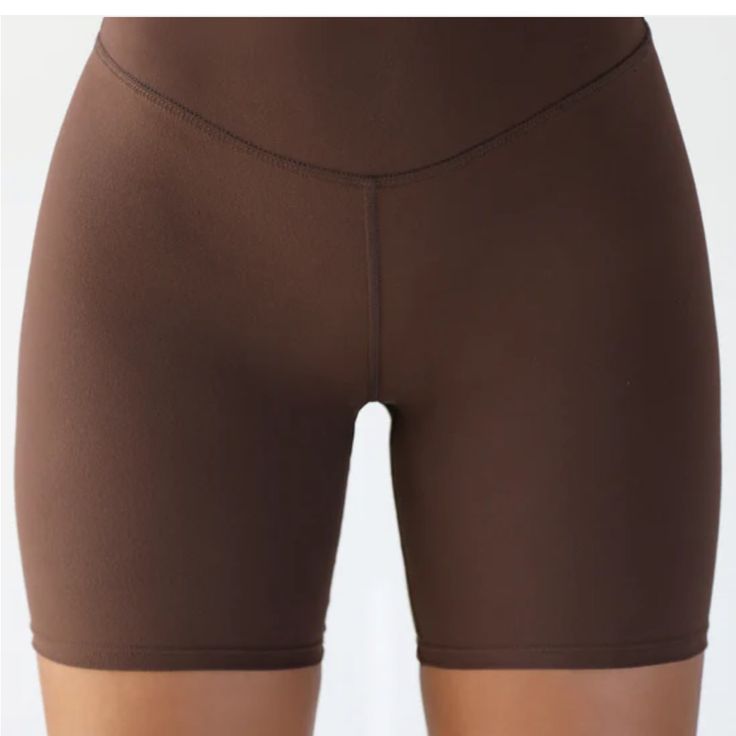 **Brand New With Tags! Never Worn High-Rise Shorts With Slimming And Contouring Waistband, And A 5.5" Inseam. Body Contouring Fabric That Feels Like A Second Skin Super Soft And Stretchy Hugs Curves For A Sleek And Sculpted Look Designed To Retain Its Shape All Day Long, Wear After Wear Color: Sueded Umber Sizing: X/S (0-2), S/M (4-6), M/L (8-10) Model Is 5'8" And Wearing Size X/S Fabric: 76% Polyester, 24% Spandex Care: Machine Wash Cold With Like Colors. Care: Lay Flat To Dry. Joah Brown | Mad Sporty Fitted Brown Biker Shorts, Brown Short Length Activewear For Yoga, Brown Sporty Biker Shorts For Sports, Sporty Brown Biker Shorts For Sports, Sporty Brown Biker Shorts, Brown Athleisure Activewear With Built-in Shorts, Stretch Brown Sports Shorts, Brown Stretch Shorts For Sports, Brown Stretch Sports Shorts