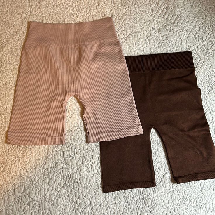 Pink Biker Shorts Brand: Avocado Condition: Never Worn Size: S/M Brown Biker Shorts Brand:Bozzolo Condition: Never Worn Size: M/L Pink Bottoms With Built-in Shorts Above Knee, Pink Stretch Short Pants, Pink High-waisted Stretch Shorts, Pink Stretch High-waisted Shorts, Stretch Pink High-waisted Shorts, Pink Stretch Knee-length Biker Shorts, Pink Mid-thigh Length Shorts For Loungewear, Trendy Pink Mid-thigh Length Bottoms, Pink Bottoms With Built-in Shorts, Above Knee