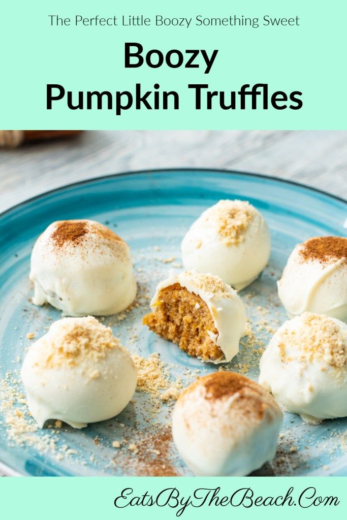 boozy pumpkin truffles on a blue plate