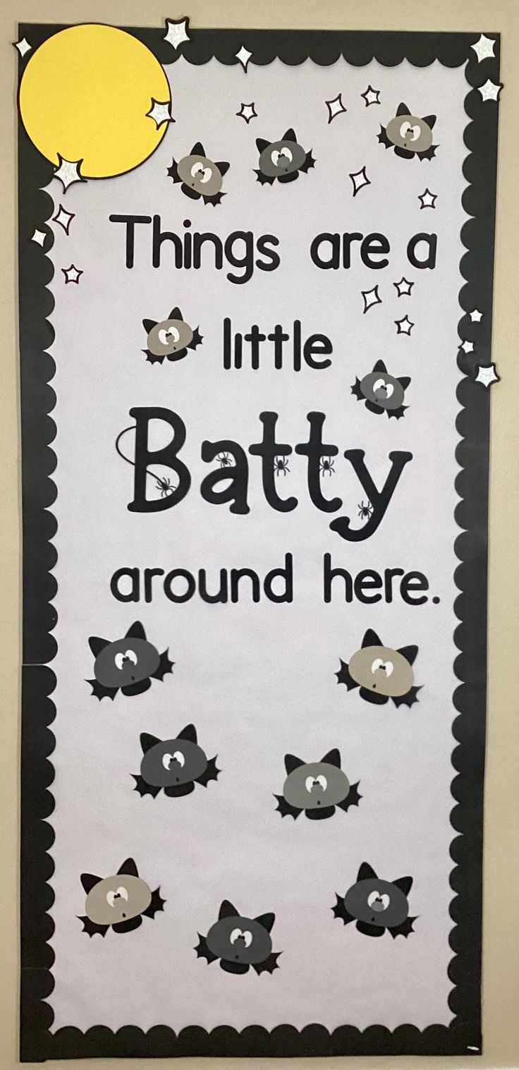 a bulletin board with black and white writing that says things are a little batty around here