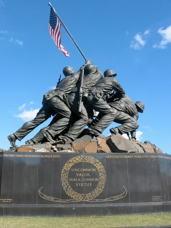 there is a monument with three soldiers on it