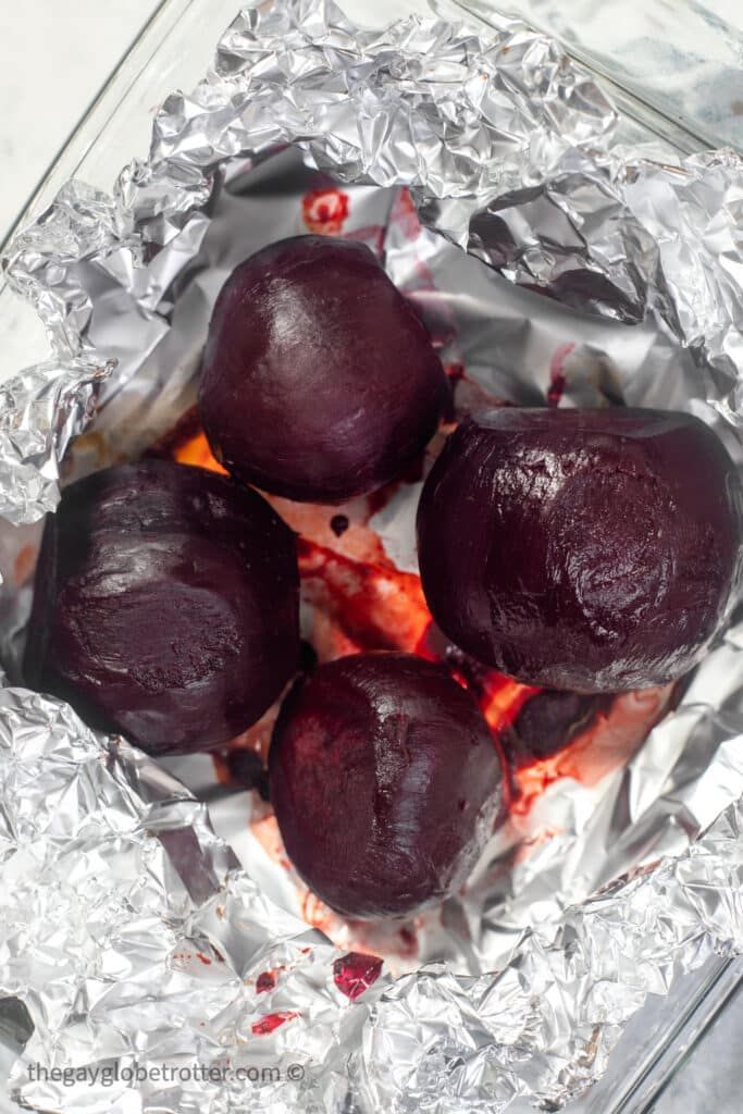 four pieces of beets sitting on top of tin foil