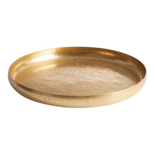 a gold plate on a white background