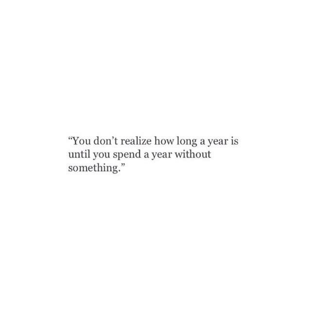 a white wall with a quote on it that says, you don't really know long a year is until you spend a year without something