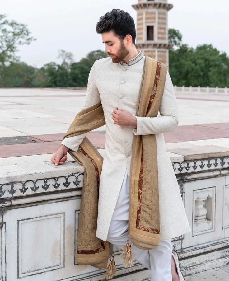 Pakistani Groom Dress in Sherwani Style with Shawl – Nameera by Farooq Wedding Traditional Wear With Naqshi In Jamawar, Wedding Traditional Wear In Jamawar With Naqshi, Reception Jamawar Kurta With Dupatta, Semi-stitched Naqshi Kurta For Weddings, Jamawar Kurta With Dupatta For Reception, Wedding Semi-stitched Naqshi Kurta, Traditional Wedding Wear With Dabka On Jamawar, Traditional Jamawar Unstitched Suit For Reception, Fitted Jamawar Sherwani For Wedding