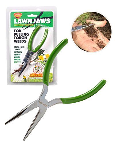 a pair of scissors with green handles are shown in front of a white background and an ad for lawn jawss