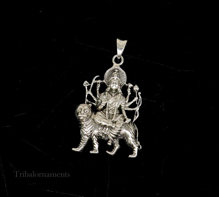 Divine 92.5 sterling silver Indian Hindu Idols Blessing Goddess Bhawani/Durga/Santoshi maa with lion vintage antique style stunning divine pendant, best gifting unisex jewelry from India. Metal-925 sterling silver. Item type-Pendant/ Locket Weight-17.910 grams. Height-5.9 centimeter. Width-3.5 centimeters. Stamped-925. Finish-Oxidized. note :chain is not include in this price, to purchase chain please visit following links: https://www.etsy.com/listing/823425858/16-to-30-long-screw-chain-925-ste Ceremonial Locket Jewelry For Diwali, Traditional Locket Jewelry For Navratri, Hallmarked Jewelry For Puja And Navratri, Spiritual Oxidized Jewelry For Navratri, Silver Spiritual Necklaces For Navratri, Spiritual Silver Necklaces For Navratri, Locket Jewelry For Diwali Rituals, Diwali Rituals Locket Jewelry, Oxidized Jewelry For Navratri Puja