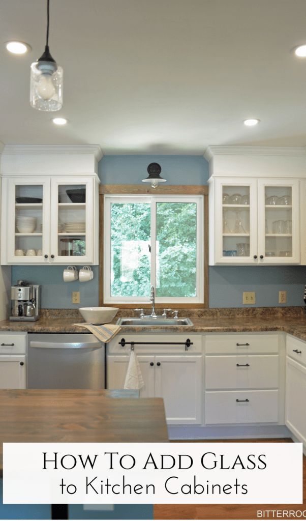 a kitchen with white cabinets and light blue walls that says how to add glass to kitchen cabinets