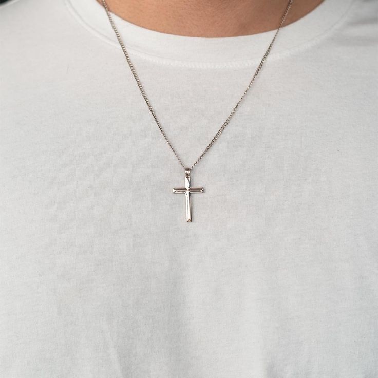 Introducing the knife edge cross necklace! A modern design with sleek edges, this cross makes for a simple, yet elegant everyday piece. Silver Cross Necklace Mens, Minimalist Cross Pendant Necklace For Everyday Wear, Minimalist Cross Pendant Necklace For Everyday, Minimalist Cross Necklace For Everyday, Simple Everyday Cross Jewelry, Elegant Stainless Steel Cross Pendant Necklace, Modern Crucifix Cross Necklace As Gift, Elegant Stainless Steel Cross Necklace, Minimalist Daily Wear Cross Pendant Necklace