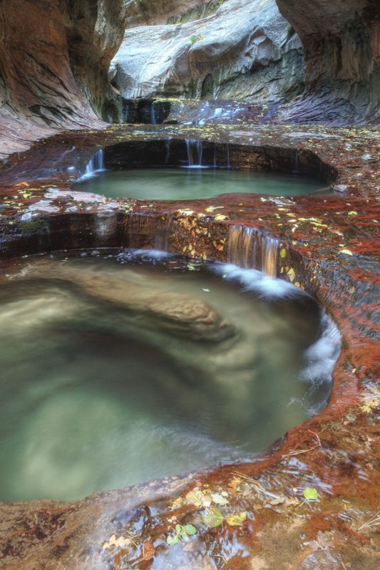 an image of a waterfall in the middle of a river with text that reads pools look like eyes $ 29 99