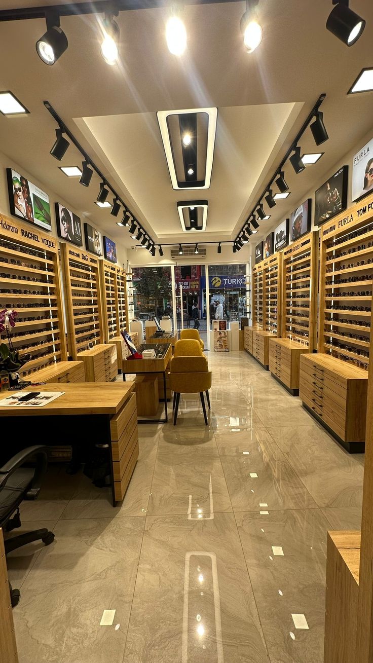 the inside of a store with lots of wooden shelves