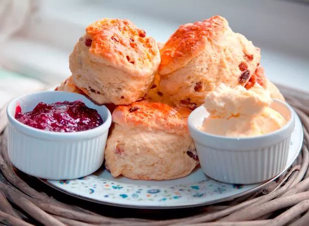 scones with jam and butter on a plate