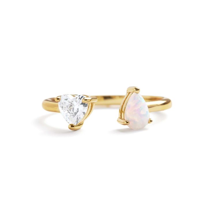 Toi Et Moi Heart Ring - where timeless elegance meets personal significance. Plated in gold, this ring features a birthstone crystal and a heart crystal. Choose from 12 distinctive birthstones, representing each month, to add a personalized touch. Whether gifting a loved one or treating yourself, this ring beautifully symbolizes connection and love. • Size – Download our Ring Size Guide here Yellow Gold Crystal Promise Ring Birthstone, 14k Gold Promise Crystal Ring With Birthstone, 14k Gold Crystal Birthstone Ring For Promise, 14k Gold Birthstone Crystal Ring For Promise, Gold Opal Birthstone Ring For Anniversary, Heart Ring With Birthstone For Promise, Dainty Heart Ring With Birthstone For Anniversary, Open Heart Ring With Birthstone For Promise, Promise Heart Ring With Birthstone