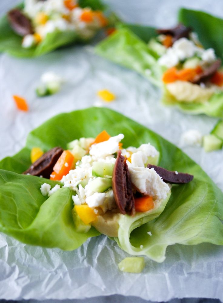 lettuce wraps with carrots, celery and feta cheese