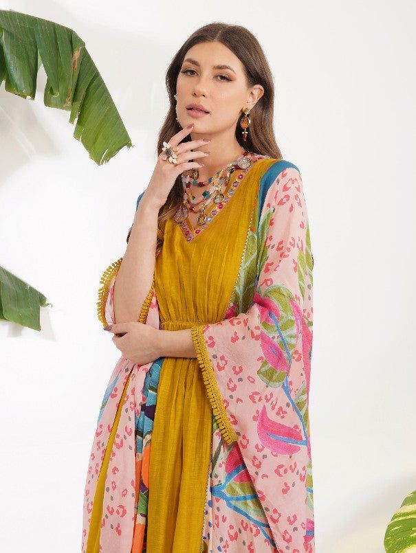 Featuring a multi coloured printed kaftan highlighted with mirrorwork on neckline. It comes with a slip. Color: Yellow Fabric: Viscose Cotton Silk, Chanderi Embroidery / Work Details: Mirrorwork Note: Wash Care - Dry Clean only The product will be delivered within 3-4 weeks of order placed Relaxed Fit Bottom not included woth the product Bollywood Style Kaftan With Dabka Work For Summer, Yellow Anarkali Kaftan For Festive Occasions, Yellow Anarkali Kaftan For Eid, Bohemian Sets With Mirror Work For Spring, Bollywood Style Festival Kaftan With Printed Motifs, Bohemian Spring Sets With Mirror Work, Spring Bohemian Sets With Mirror Work, Multicolor Silk Festive Kaftan, Traditional Multicolor Designer Kaftan