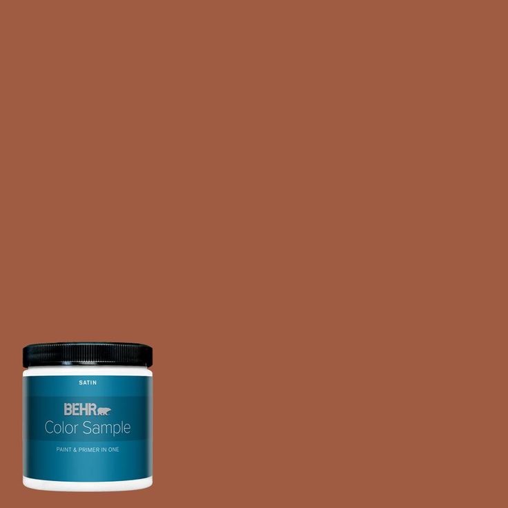 a can of behr paint on a white background