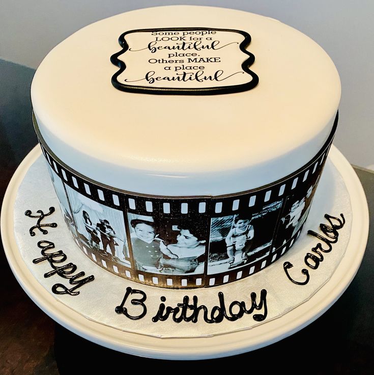 a birthday cake decorated with film strips and photos