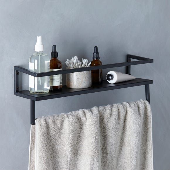 a towel rack with two bottles and soaps on it