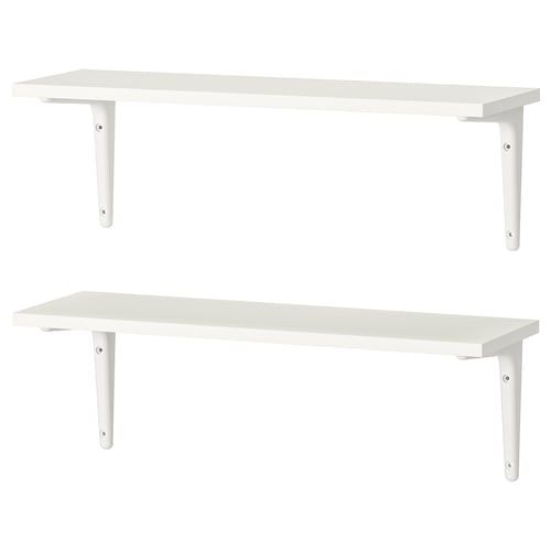 two white shelves sitting next to each other