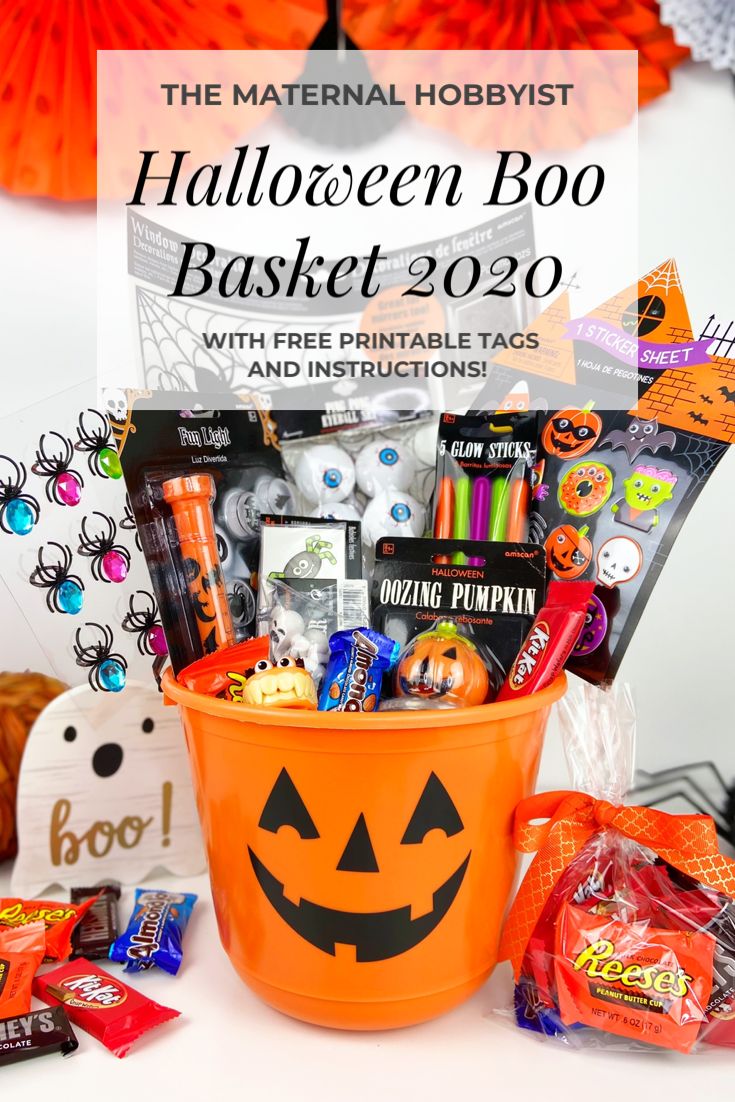 a bucket full of halloween boos with the title overlay that reads, the material hobbyist halloween boo basket 2020