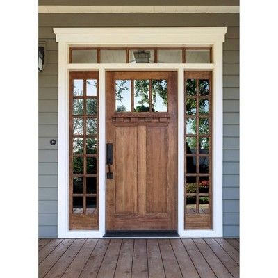 the front door to a house with two glass doors and wood planks on the floor