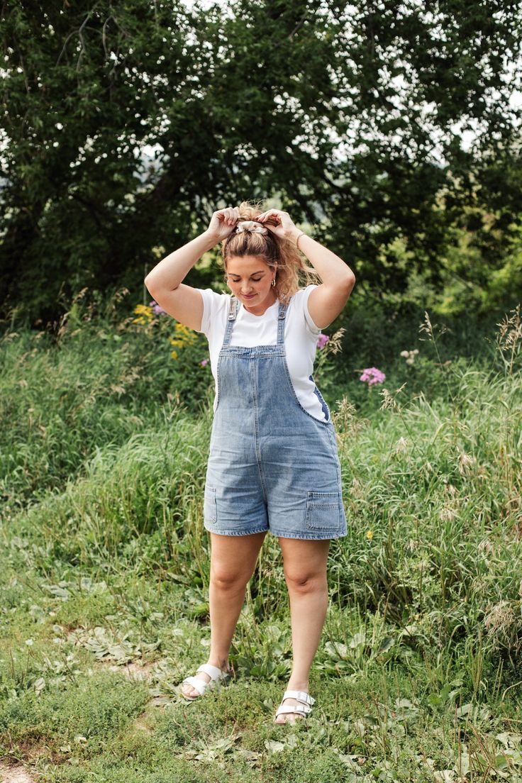 How obsessed are we with this adorable jean romper?! We're in love!!!! Medium washed- relaxed fit - 100% cotton - Non stretch - Pocket front detail - Button shoulder Model is wearing a size XL and is 5'8 Casual Shortalls Overalls For Day Out, Relaxed Fit Cotton Shortalls For Day Out, Medium Wash Overalls For Day Out, Light Wash Cotton Overall Shortalls, Light Wash Cotton Shortalls, Casual Relaxed Fit Shortalls For Day Out, Denim Shortalls For Day Out, Summer Medium Wash Shortalls For Day Out, Cotton Medium Wash Shortalls Overalls