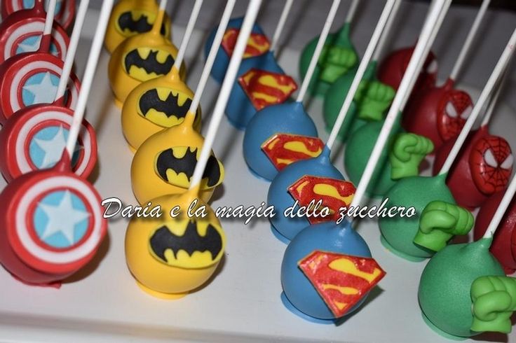 the cake pops are decorated like superheros