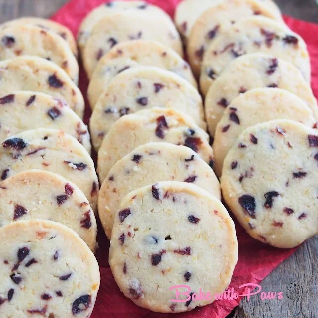 a bunch of cookies sitting on top of a red napkin