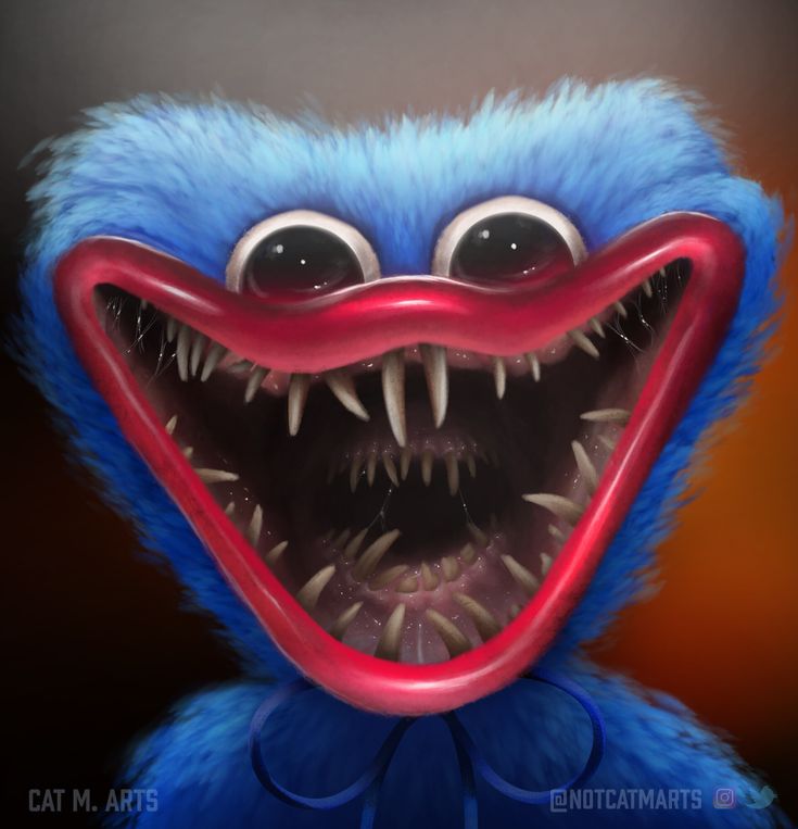 an evil looking blue monster with sharp teeth