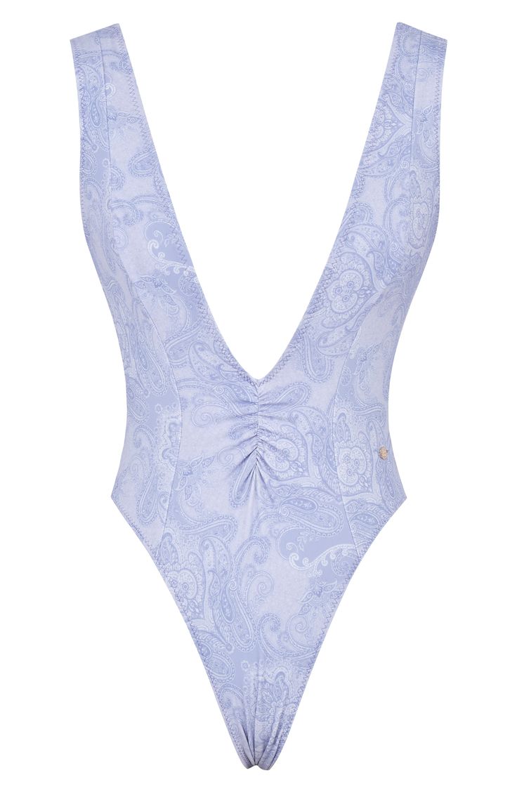 This plunging one-piece made for soaking up the sun in comfort is topped with wide straps for extra support. Exclusive retailer Plunge neck Cheeky back coverage Lined 82% polyester, 18% elastane Dry clean or hand wash, dry flat Imported Lavender Sleeveless Swimwear For Beach, Lavender One-piece Swimwear For Beach, Lavender One-piece Swimwear For Summer, Plunging One Piece Swimsuit, House Of Cb, Wide Straps, One Piece Swimsuit, The Sun, Paisley