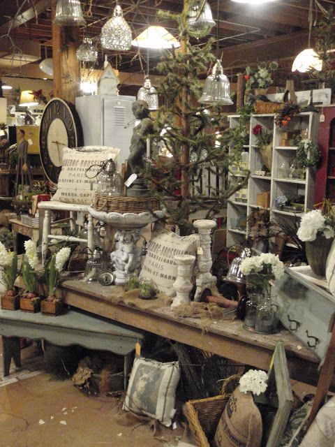 an image of a store with lots of items on the table and in front of it