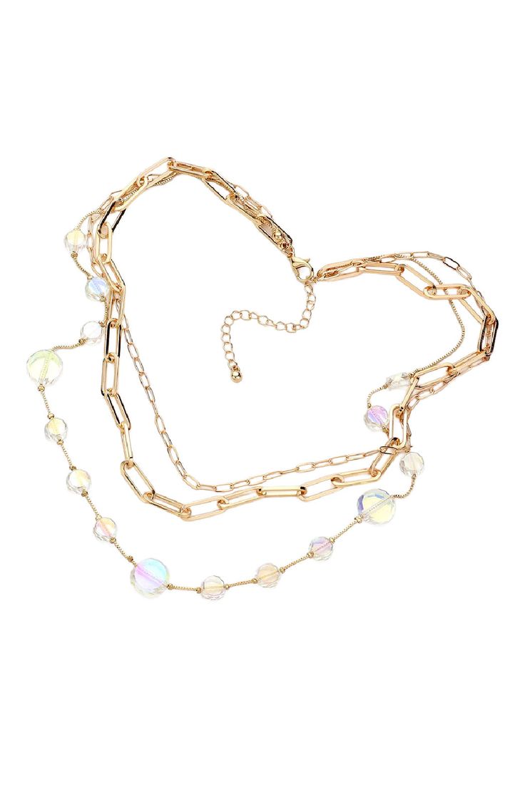 Add some sparkle to your outfit with our 3 Strand Faceted Glass Necklace! With beautiful colors that show when light hits the glass beads, this necklace is 16" long with a 2.5" extension, making it the perfect length for any neckline. Plus, it's lead and nickel compliant for all-day wear. Shine on in style! Adjustable Gold Crystal Glass Necklace, Multi-strand Glass Necklaces For Party, Clear Glass Beaded Chain Necklace, Clear Necklace With Adjustable Chain For Party, Party Necklace With Adjustable Chain In Clear Color, Elegant Iridescent Glass Necklaces, Shine On, Faceted Glass, The Glass