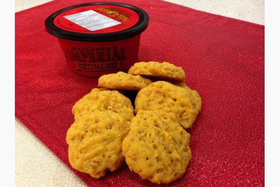 cookies and ice cream sitting on a red mat