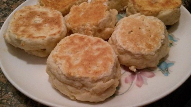 some biscuits are sitting on a white plate