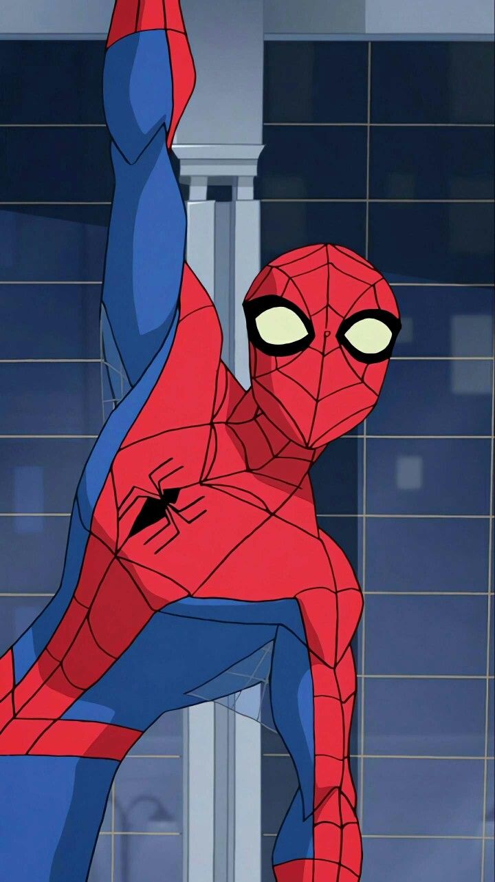 the spider - man is standing in front of a tiled wall with his arms up