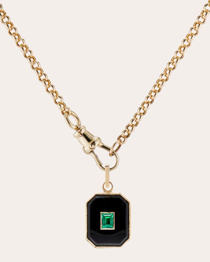 Suspended from Ashley Zhang's signature Belcher chain, this 14-karat gold necklace details its octagonal pendant with inlaid black onyx and beaded milgrain trim. The rectangular emerald center is placed in a classic bezel setting for a vintage look. Clip closure 14k yellow gold, black onyx and emerald Carat: 0.17 ctw emerald Polish with soft cloth Handmade in the USA Measurements Chain length: 18in Pendant width: 0.47in Pendant length (including bail): 0.96in Emerald Necklace Pendant, Belcher Chain, Emerald Pendant, Bezel Pendant, Bezel Setting, Vintage Look, Black Onyx, Gold Black, Chain Lengths