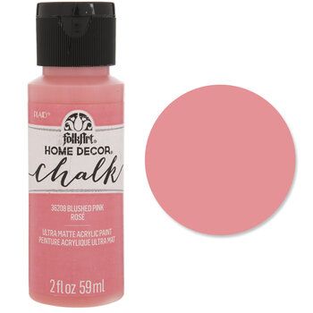 a bottle of pink acrylic paint with the words home decor chalk on it