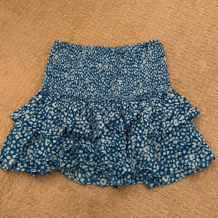 This Is A Perfect Skirt For The Beach Or For A Cute Brunch! Never Worn And Great Material! Casual Stretch Mini Skirt For Brunch, Casual Tiered Skirt For Brunch, Blue Stretch Ruffle Skort, Blue Ruffled Stretch Skort, Blue Mini Skirt For Day Out, Blue Tiered Mini Skirt For Vacation, Blue Tiered Skirt Skort For Day Out, Blue Tiered Skort For Day Out, Blue Tiered Mini Skirt For Day Out